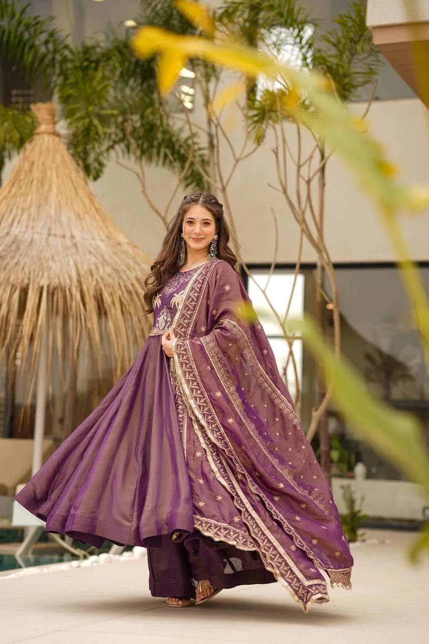 Shimmer Febric featuring intricate embroidery on kurta.